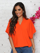 Blusa feminina elegante com decote em V