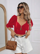 Blusa elegante com babados para mulheres