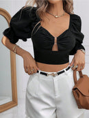 Blusa elegante com babados para mulheres