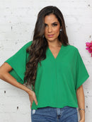 Blusa feminina elegante com decote em V