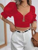 Blusa elegante com babados para mulheres