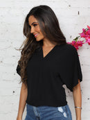 Blusa feminina elegante com decote em V