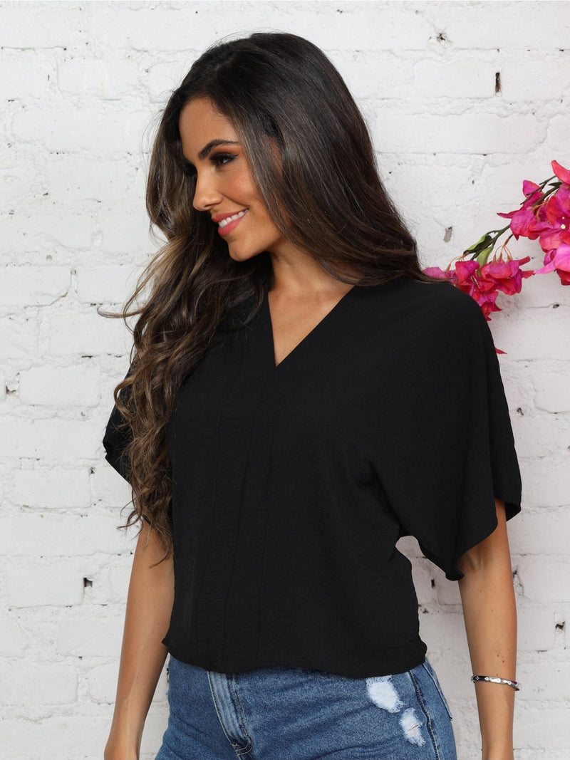 Blusa feminina elegante com decote em V